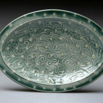 Oval Platter slip cast porcelain, glaze 2”x10”x14.5”, 2006, photo credit: Brian Oglesbe